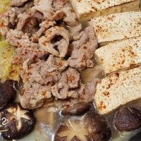可能是豆腐、火鍋和文字的圖像