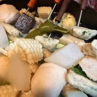可能是起司火鍋、豆腐和火鍋的圖像