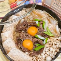 可能是拉麵、豆腐、火鍋和文字的圖像