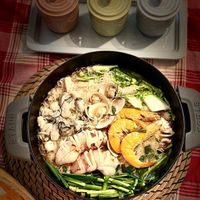 可能是豆腐、火鍋、西班牙大鍋飯和香菇的圖像
