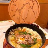 可能是火鍋、豆腐和文字的圖像