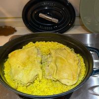 可能是燉小牛膝、印度香料飯和北非小米飯的圖像