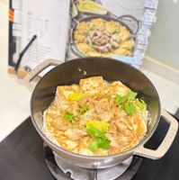 可能是粥、豆腐、火鍋和文字的圖像
