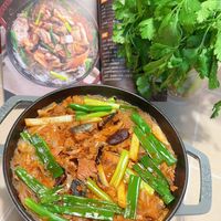 可能是火鍋、豆腐和文字的圖像