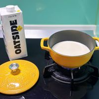 可能是粥和顯示的文字是「 Oat OatM*Ik N M*Ik ATSIP OATSIDE រាញ Parista STBE 」的圖像