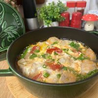 可能是拉麵、豆腐、粥和文字的圖像