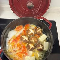 可能是火鍋、豆腐和文字的圖像