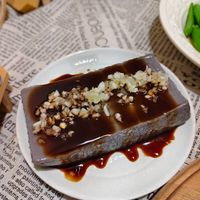 可能是壽司、豆腐和文字的圖像