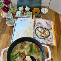 可能是粥、拉麵、豆腐和文字的圖像