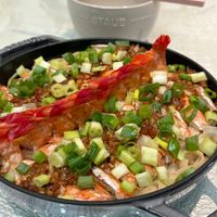 可能是粥、西班牙大鍋飯和文字的圖像