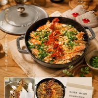 可能是燉小牛膝、西班牙大鍋飯和文字的圖像