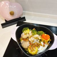 可能是豆腐、火鍋、紅心和文字的圖像