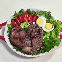 可能是肉排和文字的圖像