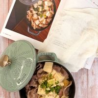 可能是火鍋、豆腐、香菇和文字的圖像