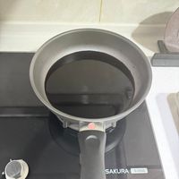 可能是鬆餅機和顯示的文字是「 SAKURA G-2522G 」的圖像