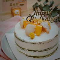 可能是戚風蛋糕、龍眼和文字的圖像