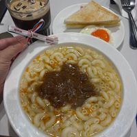 可能是拉麵、水波蛋、粥和文字的圖像