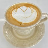 可能是咖啡、紅心和咖啡杯的圖像