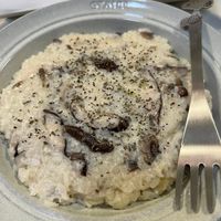 可能是香菇、粥和文字的圖像