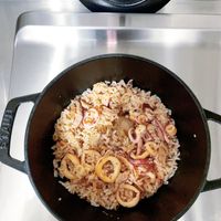 可能是西班牙大鍋飯、炒飯和印度香料飯的圖像