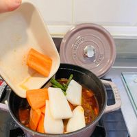 可能是火鍋、豆腐和文字的圖像